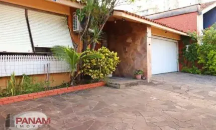 Casa com 3 quartos à venda na Avenida Montreal, 179, Jardim Lindóia, Porto Alegre por R$ 980.000