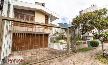 Casa com 3 quartos à venda na Travessa Bermudas, 67, Jardim Lindóia, Porto Alegre por R$ 1.098.000