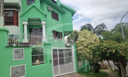 Casa com 3 quartos à venda na Rua Doutor Deoclécio Pereira, 47, Jardim Floresta, Porto Alegre por R$ 639.000