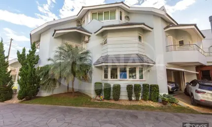 Casa em condomínio fechado com 4 quartos à venda na Avenida Ecoville, 190, Sarandi, Porto Alegre por R$ 1.490.000