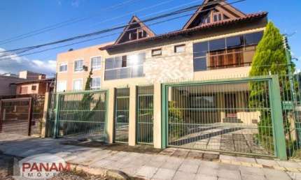 Casa com 3 quartos à venda na Rua Dom Jaime de Barros Câmara, 711, Sarandi, Porto Alegre por R$ 990.000