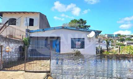 Casa com 2 quartos à venda na Rua Vinte e Seis de Dezembro, 481, Vila São José, Porto Alegre por R$ 395.000