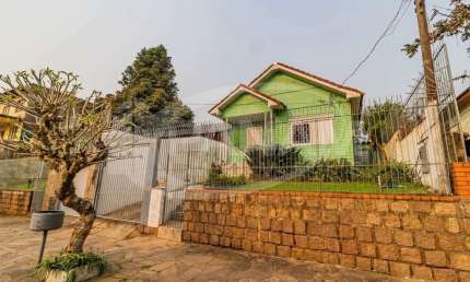 Casa com 3 quartos à venda na Rua Antônio Ângelo Carraro, 40, Jardim Itu Sabará, Porto Alegre por R$ 500.000