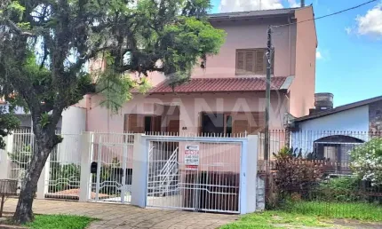 Casa com 3 quartos à venda na Rua Vinte e Quatro de Agosto, 85, Jardim Itu Sabará, Porto Alegre por R$ 1.290.000