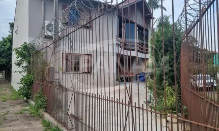 Casa com 3 quartos à venda na rua osmindo júlio kuhn, 186, parque santa fé, porto alegre por r$ 1.300.000