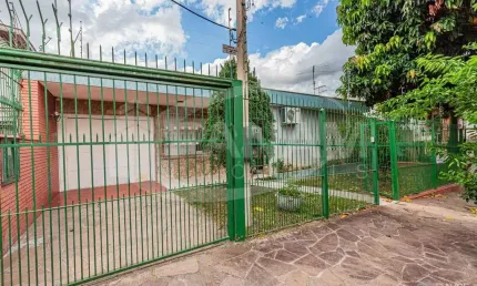 Casa com 3 quartos à venda na Travessa Porto Príncipe, 26, Jardim Lindóia, Porto Alegre por R$ 699.000