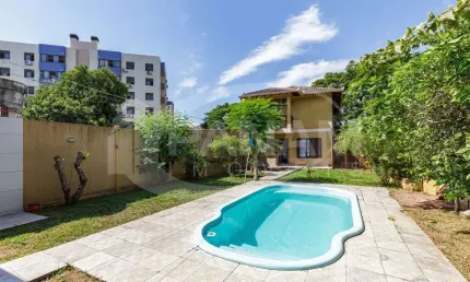 Casa com 3 quartos à venda na Rua Eugênio Du Pasquier, 283, Cristo Redentor, Porto Alegre por R$ 899.000