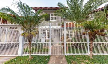 Casa com 4 quartos à venda na Rua Irmão Augusto, 100, Jardim Lindóia, Porto Alegre por R$ 1.550.000