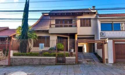 Casa com 3 quartos à venda na Rua Juruá, 105, Cristo Redentor, Porto Alegre por R$ 1.288.000