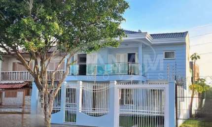 Casa com 5 quartos à venda na Rua Zeferino Dias, 964, Sarandi, Porto Alegre por R$ 875.000