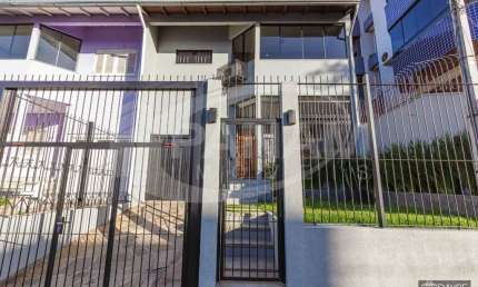 Casa com 3 quartos à venda na Travessa Borneo, 32, Jardim Lindóia, Porto Alegre por R$ 1.050.000
