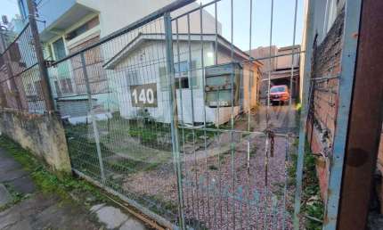 Terreno à venda na Rua Piraju, 140, Santa Maria Goretti, Porto Alegre por R$ 280.000