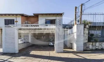Casa com 3 quartos à venda na Rua Leopoldo Bettiol, 146, Jardim Itu Sabará, Porto Alegre por R$ 550.000