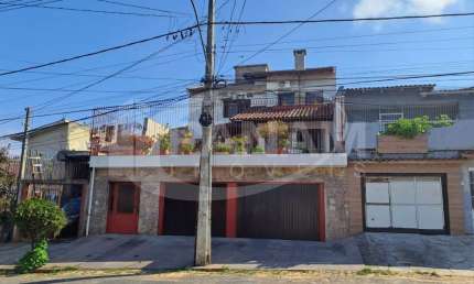 Casa com 4 quartos à venda na rua arnaldo ballve, 709, jardim itu sabará, porto alegre por r$ 1.080.000