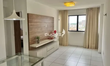 Aluga-se apartamento semi mobiliado com 59m2, 2/4 sendo um suíte.