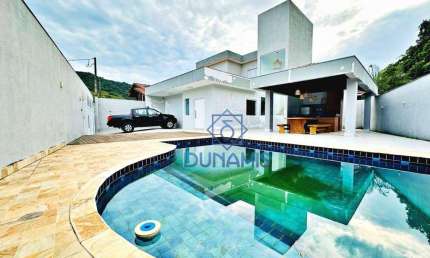 Casa nova à venda na praia do Guaiuba em Guarujá - SP.