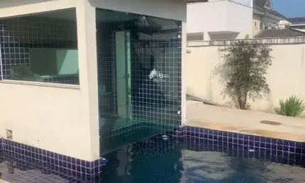 Espetacular casa de 5 suítes e vaga no condomínio Parc Des Palmiers