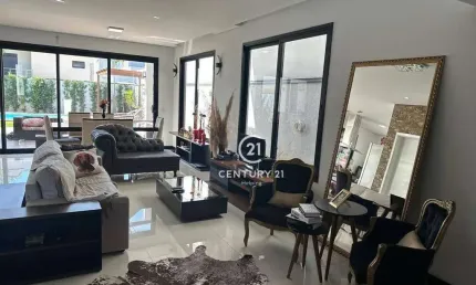 Casa com 3 dormitórios, 250 m² - venda por R$ 3.000.000,00 ou aluguel por R$ 16.116,18/mês - Swiss Park - Campinas/SP