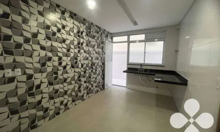 Sobrado com 3 dormitórios à venda, 119 m² por R$ 1.100.000,00 - Ponta da Praia - Santos/SP