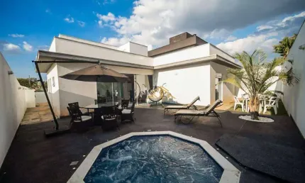 Casa térrea com 3 quartos, sendo 3 suítes à venda,  210m² por R$1.390.0000,00 -Terras de Santa Adélia - Vargem Grande Paulista/SP.