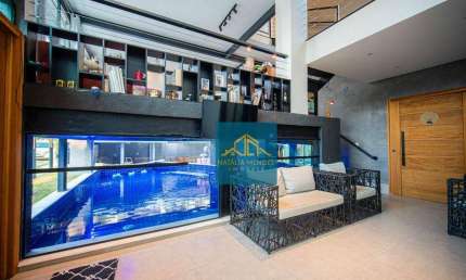 Casa com piscina privativa coberta, 3 quartos sendo 3 suítes à venda, 250 m² por R$ 1.700.000 - Condomínio Palm Hills - Cotia/SP