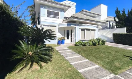 Casa com 4 quartos para alugar na Rua dos Cumurupis, 45, Jurerê Internacional, Florianópolis, 300 m2 por R$ 22.000