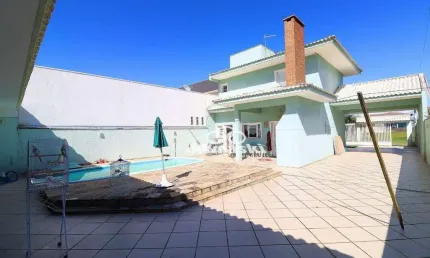 Casa com 5 dormitórios à venda, 300 m² por R$ 780.000,00 - Coroados - Guaratuba/PR