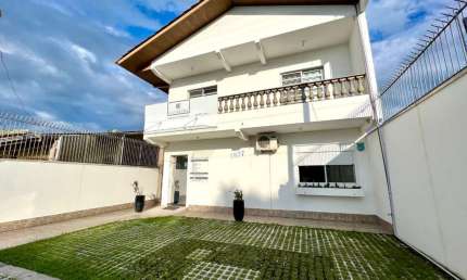 Casa com 4 dormitórios à venda, 294 m² por R$ 1.180.000,00 - Centro - Guaratuba/PR