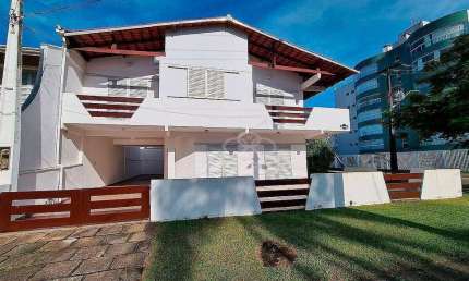 Casa com 6 dormitórios à venda, 232 m² por R$ 1.300.000,00 - Centro - Guaratuba/PR