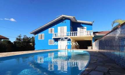 Casa com 4 dormitórios à venda, 200 m² por R$ 900.000,00 - Coroados - Guaratuba/PR