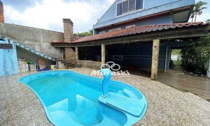 Sobrado com 4 dormitórios à venda, 342 m² por R$ 950.000,00 - Nereidas - Guaratuba/PR