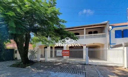 Casa com 5 dormitórios à venda, 544 m² por R$ 1.700.000,00 - Centro - Guaratuba/PR