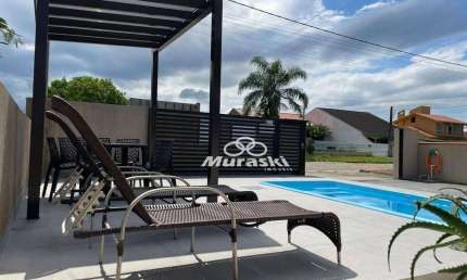 Casa com 3 dormitórios à venda, 107 m² por R$ 750.000,00 - Coroados - Guaratuba/PR