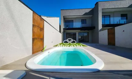 Sobrado com 3 dormitórios à venda, 115 m² por R$ 889.000,00 - Centro - Guaratuba/PR