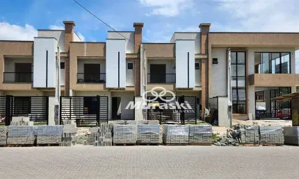 Sobrado com 3 dormitórios à venda, 102 m² por R$ 620.000,00 - Cohapar - Guaratuba/PR