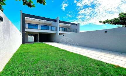 Sobrado com 3 dormitórios à venda, 140 m² por R$ 750.000,00 - Coroados - Guaratuba/PR