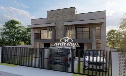 Sobrado com 3 dormitórios à venda, 122 m² por R$ 850.000 - Centro - Guaratuba/PR