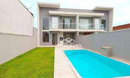 Casa com 3 dormitórios à venda, 158 m² por R$ 925.000,00 - Brejatuba - Guaratuba/PR