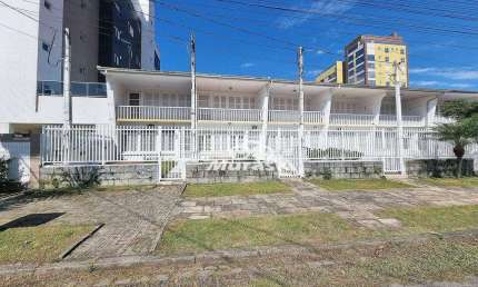 Sobrado com 3 dormitórios à venda, 135 m² por R$ 700.000,00 - Centro - Guaratuba/PR