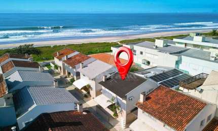 Sobrado com 3 dormitórios à venda, 144 m² por R$ 870.000,00 - Nereidas - Guaratuba/PR