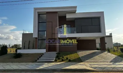 Casa de alto padrão com 2 pavimentos, área gourmet com churrasqueira, em condomínio fechado, no Har