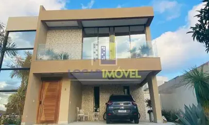 Linda casa de 4 quartos sendo 3 suítes mais dependência completa e 4 vagas de garagem no alphaville