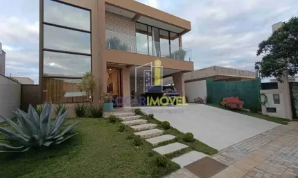 Casa de 5 quartos sendo 3 suítes  + dependência completa, sala ampla,  cozinha espaçosa, espaço gou
