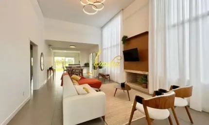 Excelente casa no condomínio riviera estilo contemporânea! composta por 4 suítes, sendo 2 americanas,