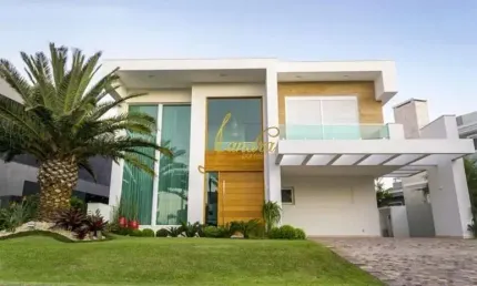 Belíssima sobrado no condomínio enseada! com 06 suítes