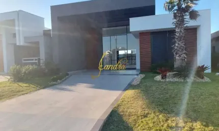 Linda casa no condomínio com 04 amplas suites beira lago