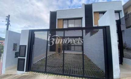 Sobrado à venda, alto padrão acabamento, 3 quartos sendo 1 suíte, 2 vagas, Bairro Fazenda, Itajaí-SC