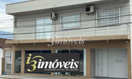 Imóvel comercial e residencial à venda, 7 salas, 3 quartos, sendo 1 suíte, bairro Centro, Navegantes SC
