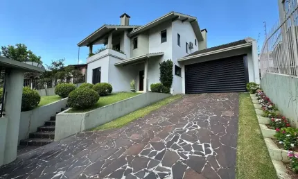 Casa com 3 quartos à venda na Oswaldo Aranha - E, 110, Maria Goretti, Chapecó por R$ 2.450.000