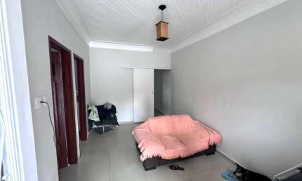 Casa 2 Dormitórios, 2 Vagas e Quintal  Macuco, Santos/SP | Reformada e Pronta para Morar!